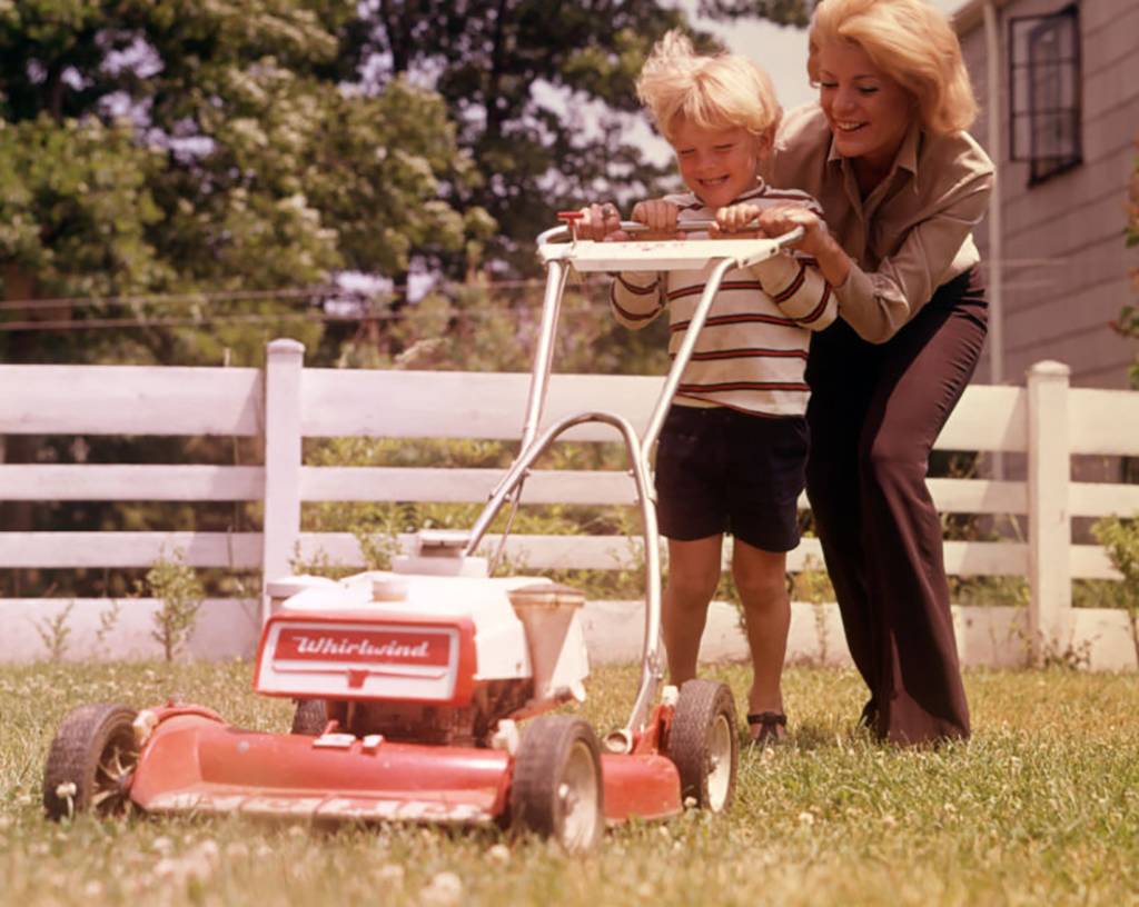 Picture of kid with lawnmower