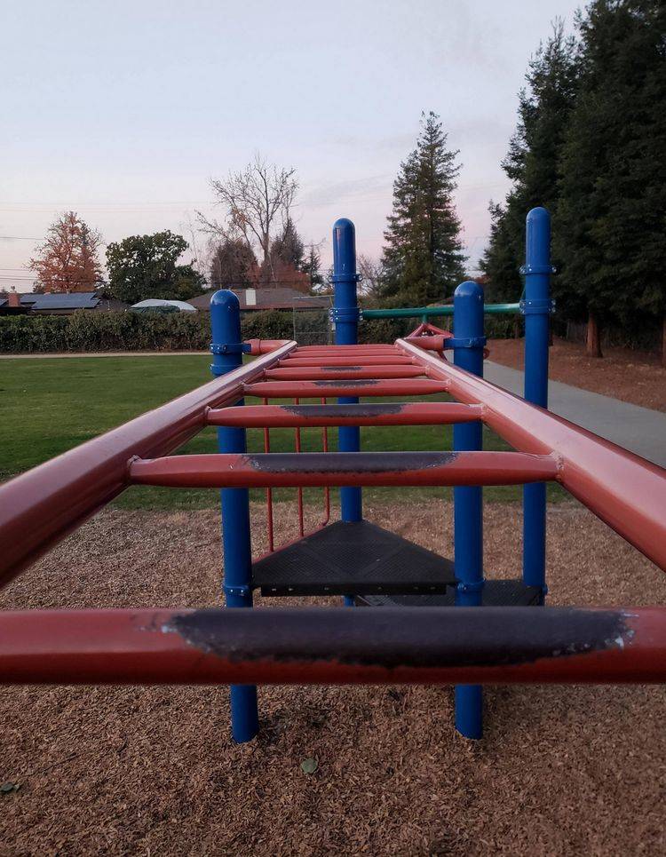 monkey bars worn down from kids