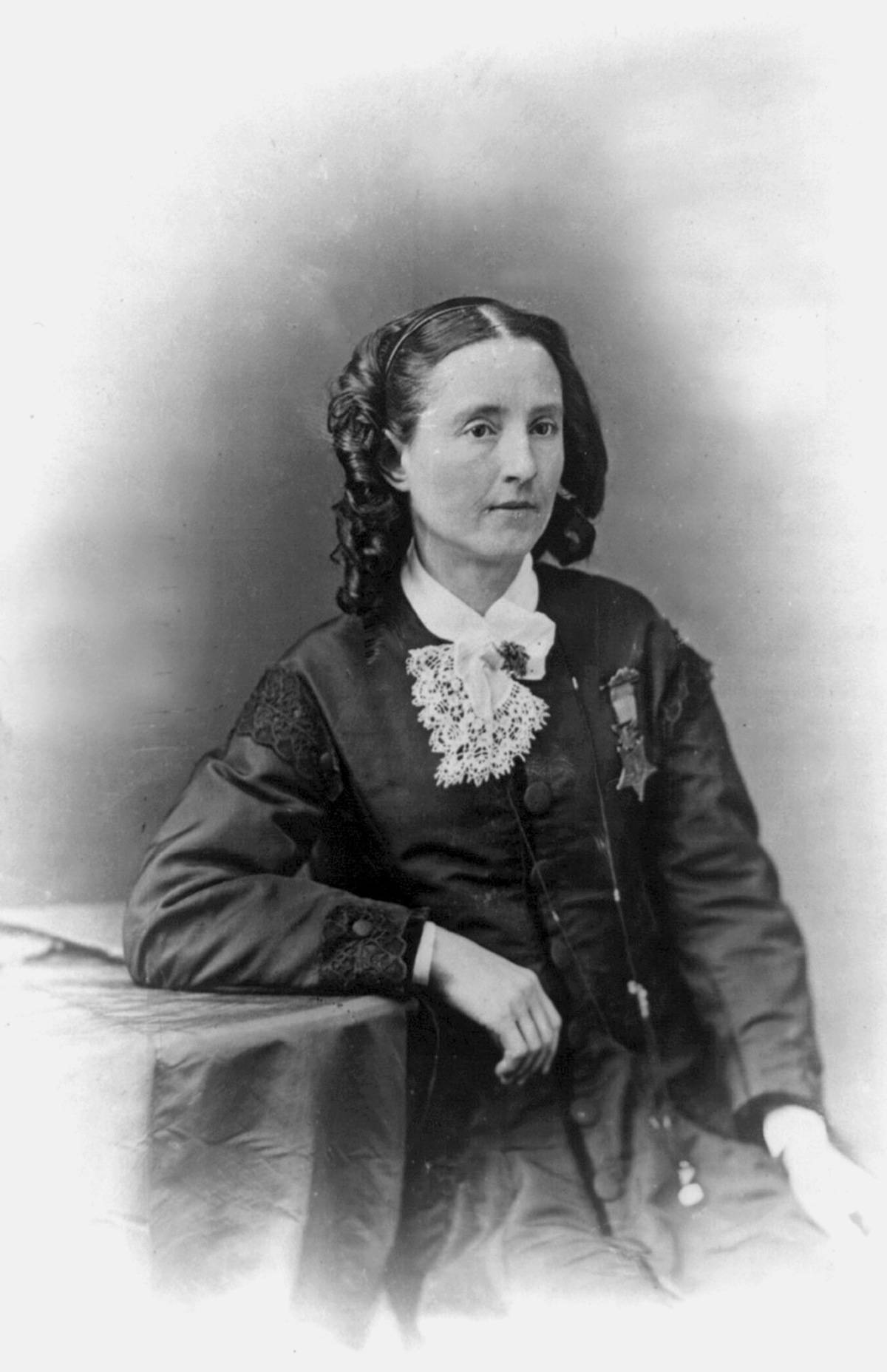 Dr. Mary Edwards Walker is photographed wearing the Medal of Honor.