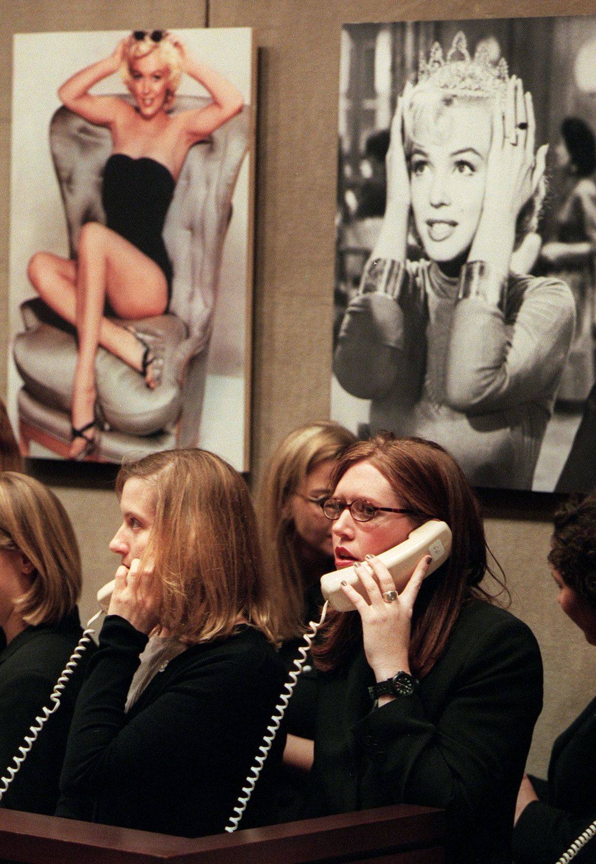 Christie's auction house employees take phone bids