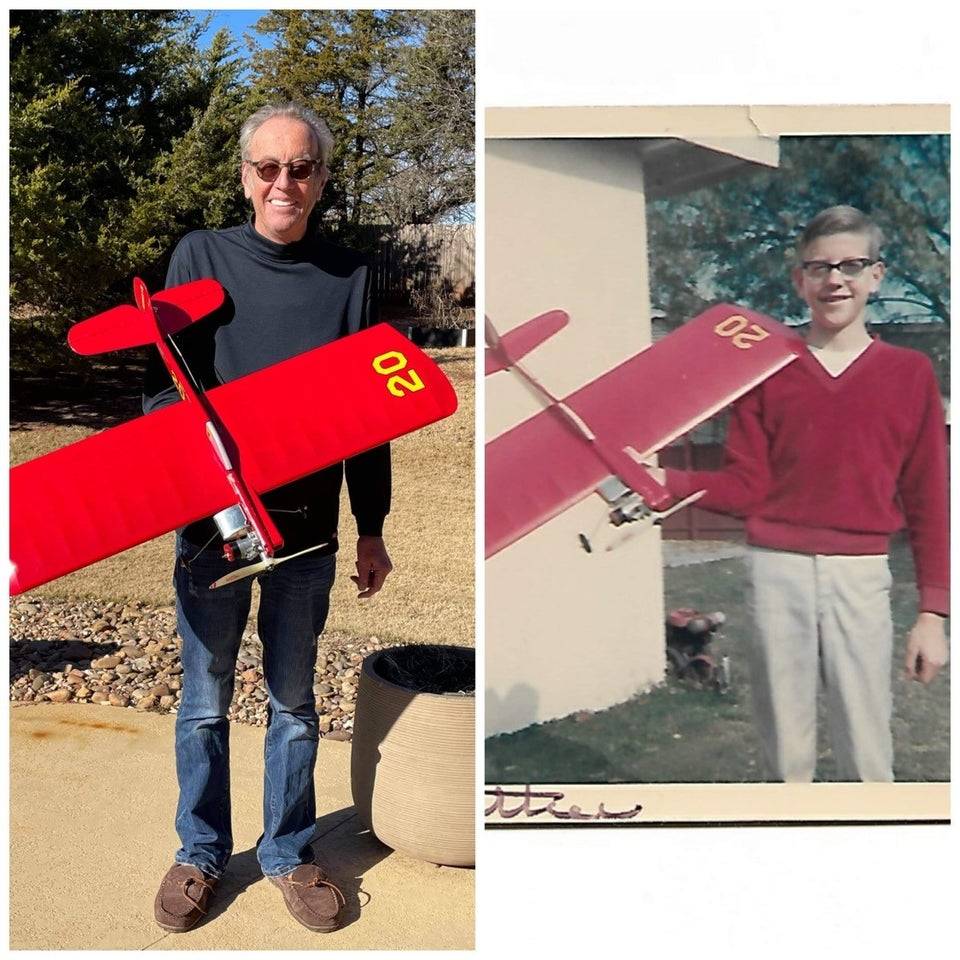 plane replica held by two