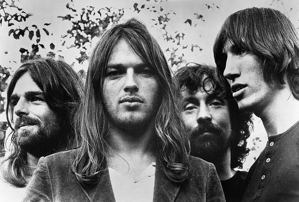 members of pink floyd in a black and white portrait