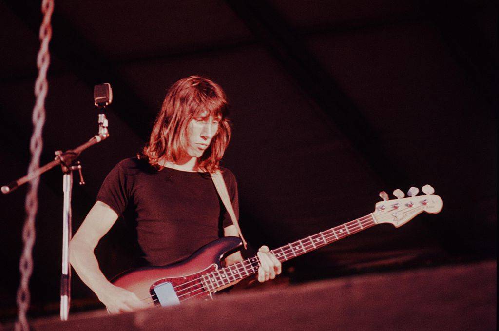 Roger Waters playing guitar