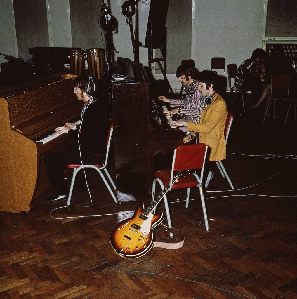 The Beatles play pianos at Abbey Road Studios, London, circa 1967