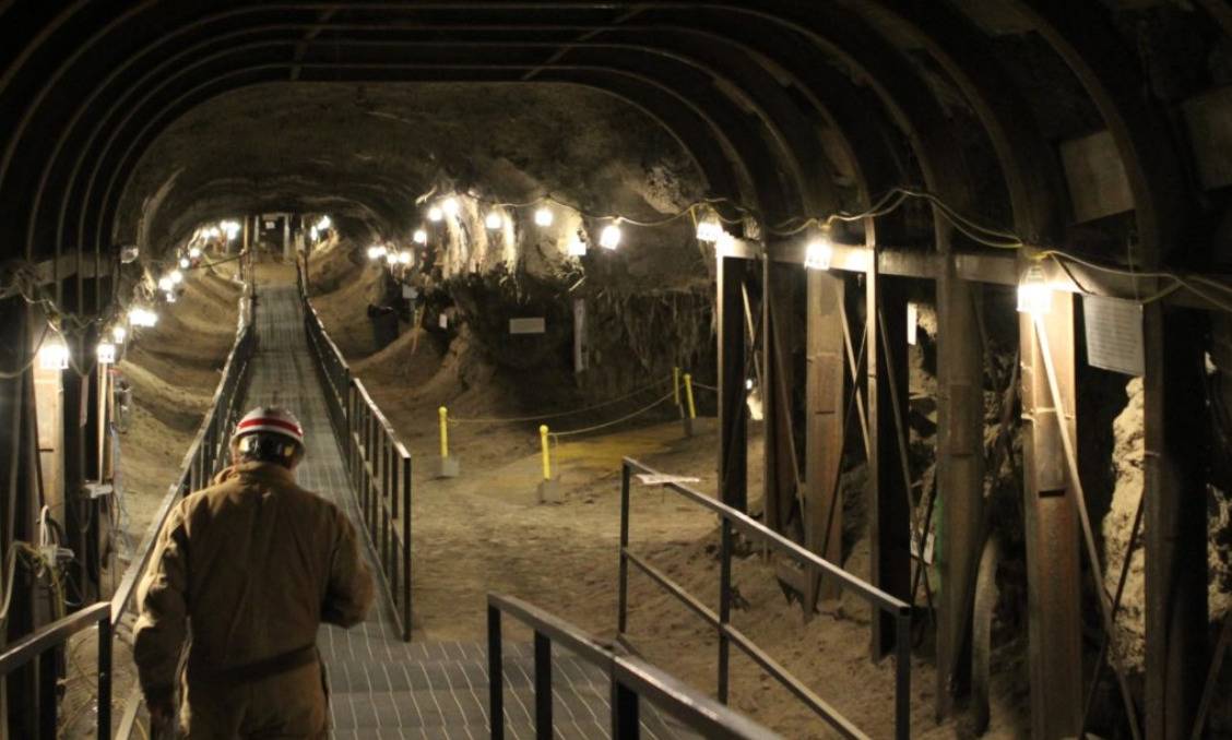 A scientist walks through a research tunnel in Fairbanks, AK.