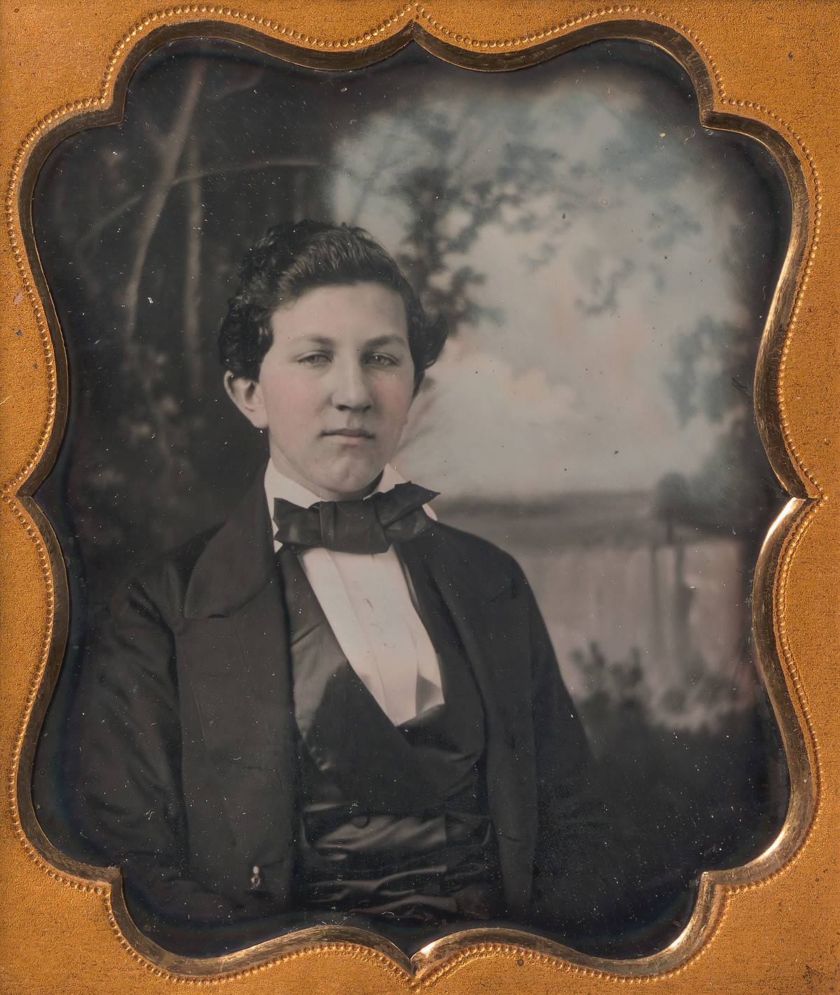 A young man is photographed in the 1850s.