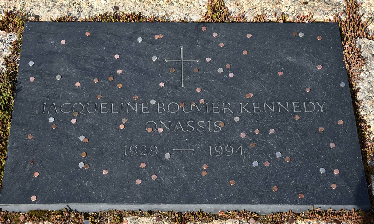 Coins are on top of Jackie Kennedy's grave.
