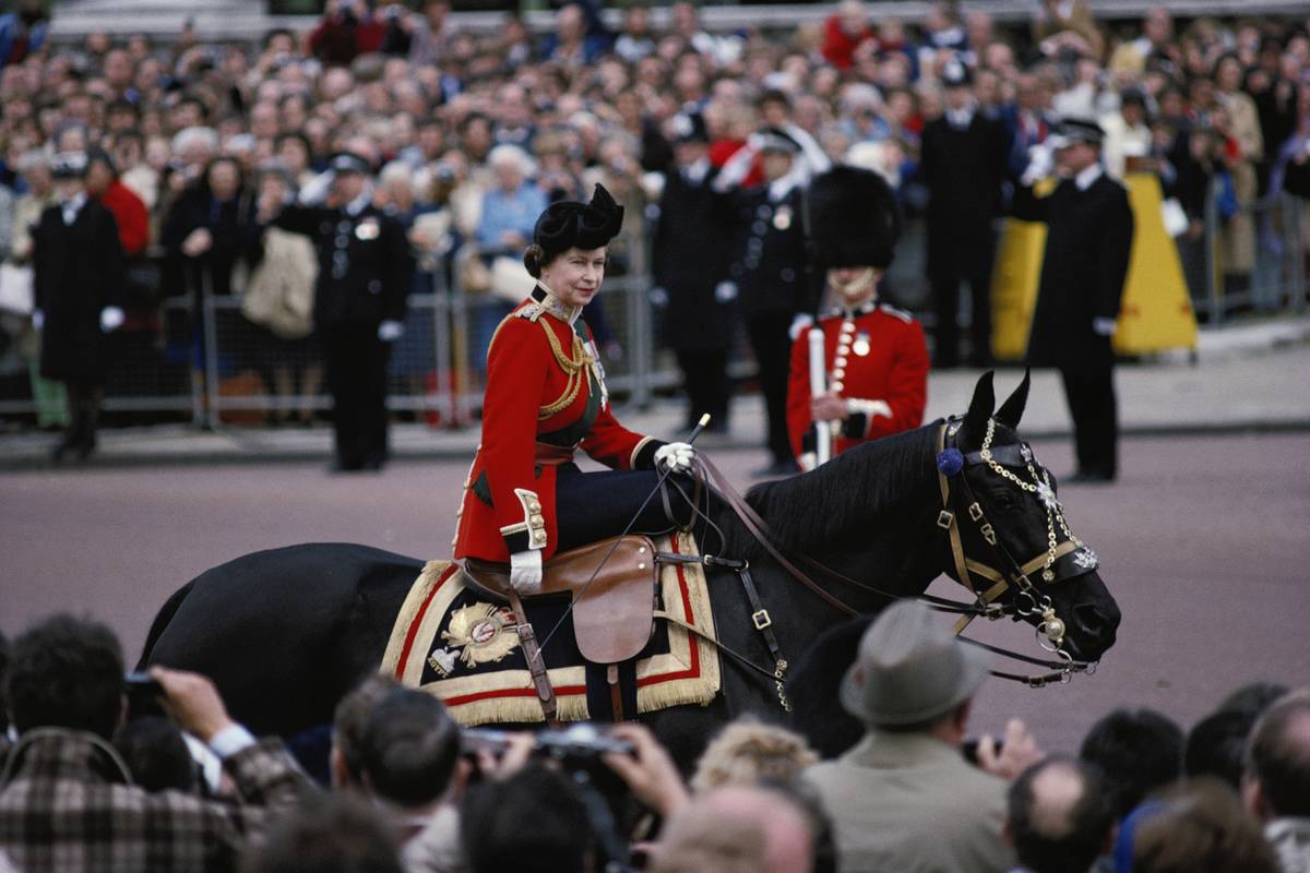 Queen Elizabeth II rides her horse, Burmase, during the Trooping the Colour ceremony.