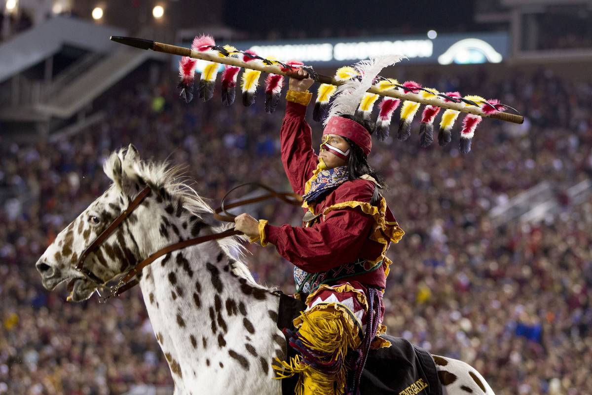 Florida State's Chief Osceola and Renegade celebrate a touchdown.