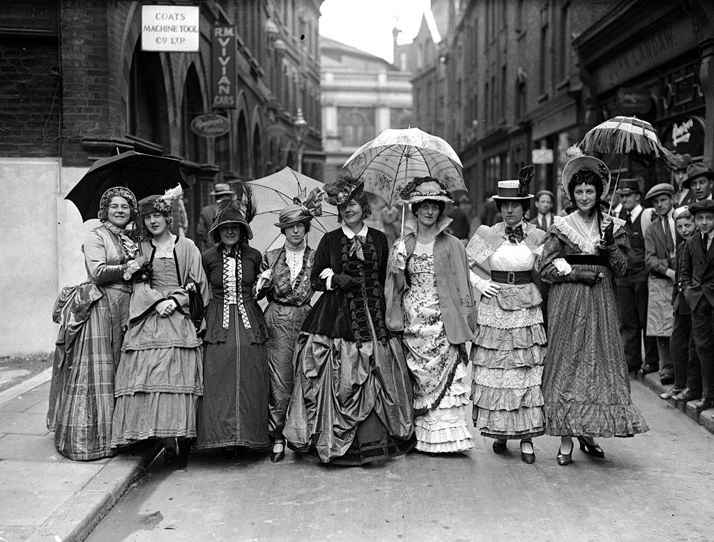 A group of women dressed in Victorian style clothing