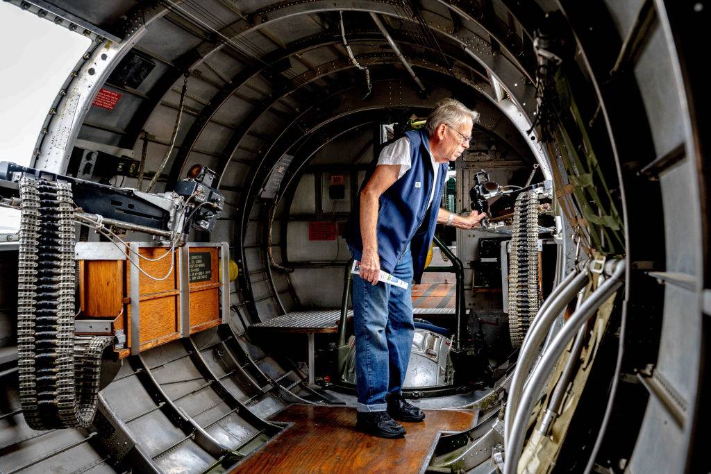 man walks through the B-17 bomber