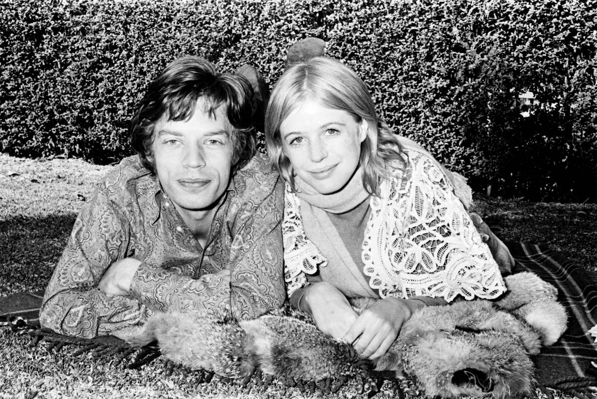Mick Jagger and Marianne Faithfull in the gardens at Mount St Margaret Hospital, Sydney, 27
