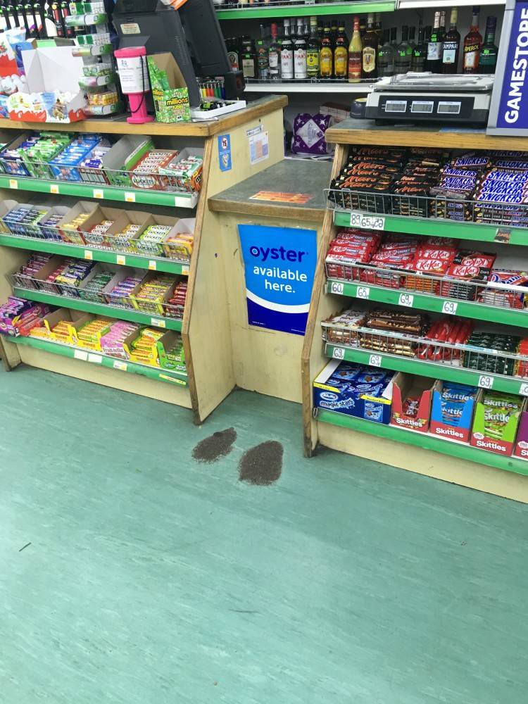 Floor worn out where customers have been standing