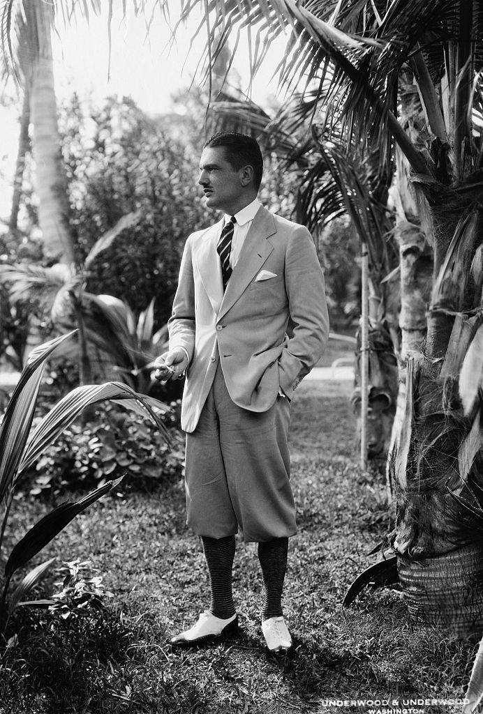 John Vernou Bouvier III near some palm trees
