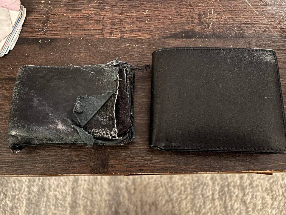 Old worn-out wallet and new one side by side