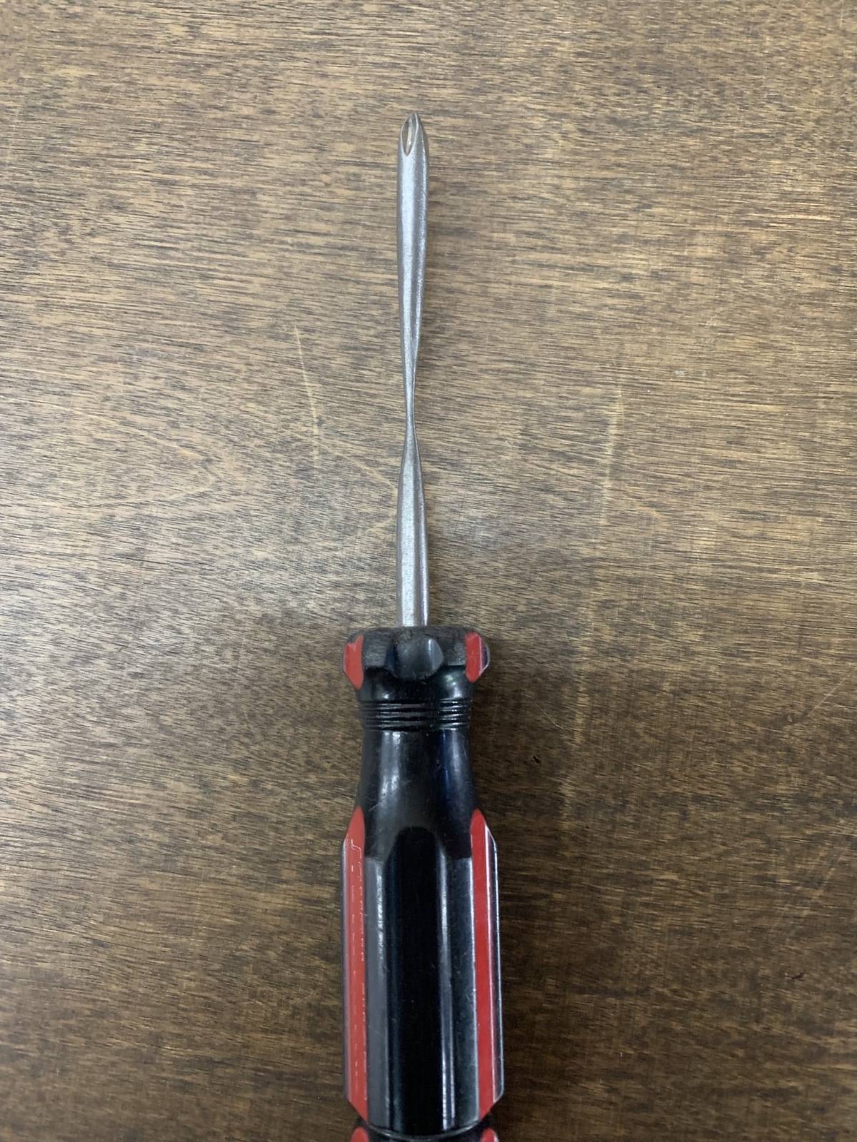 Screwdriver worn down from years of scraping grip tape at skate shop