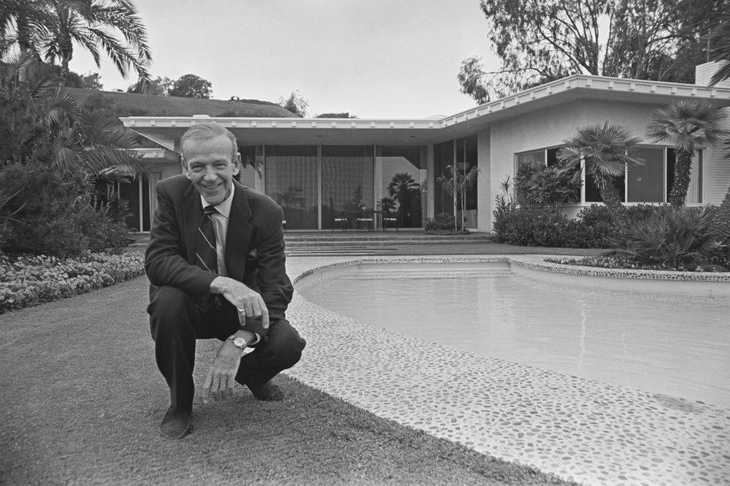 fred astaire in his backyard by the pool