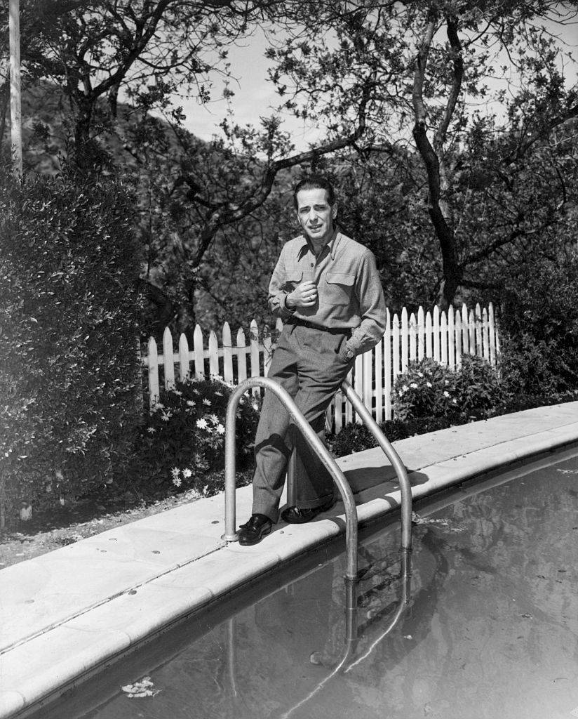 humphrey bogart at his home by the pool