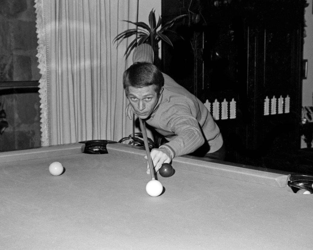 steve mcqueen playing pool at his house