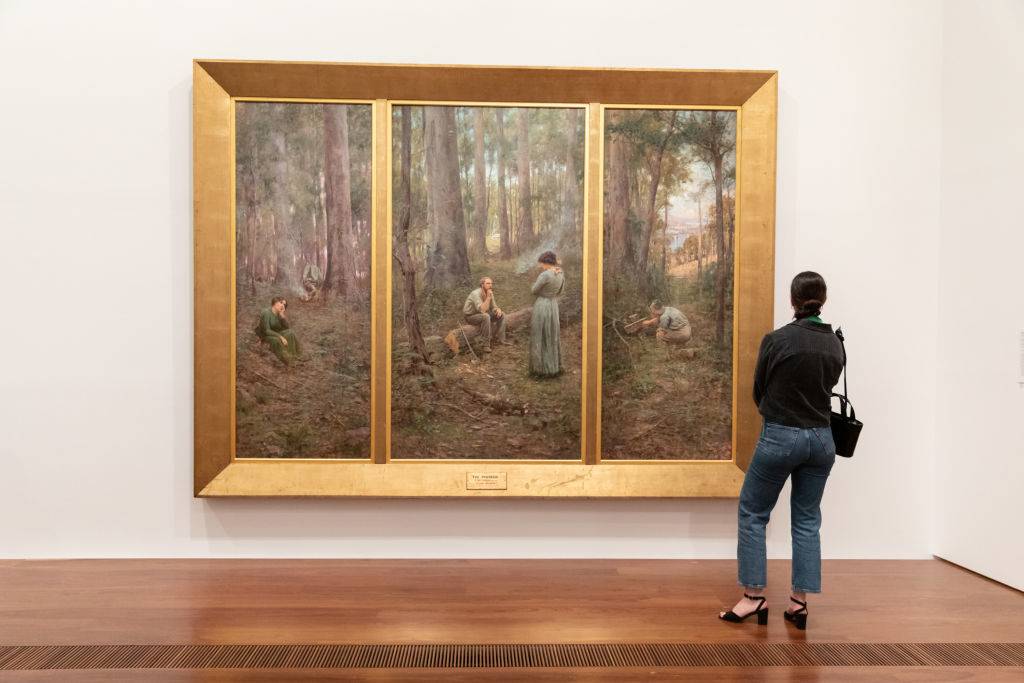 the pioneer painting with woman looking at it