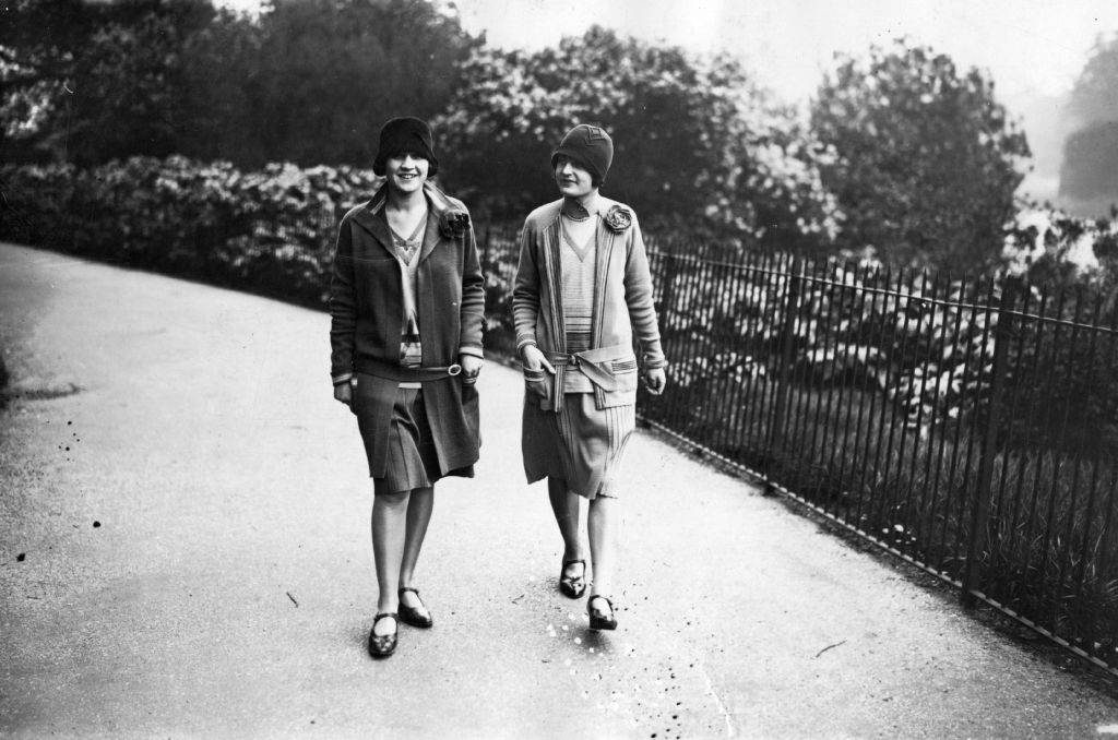 two women in the 20s wearing cloche hats