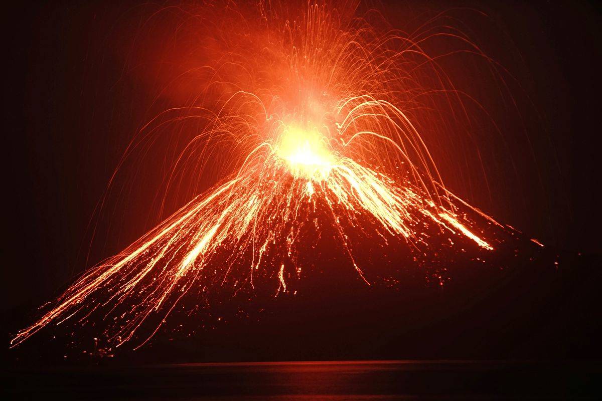 Lava streams down the Anak Krakatau volcano during a violent eruption. 