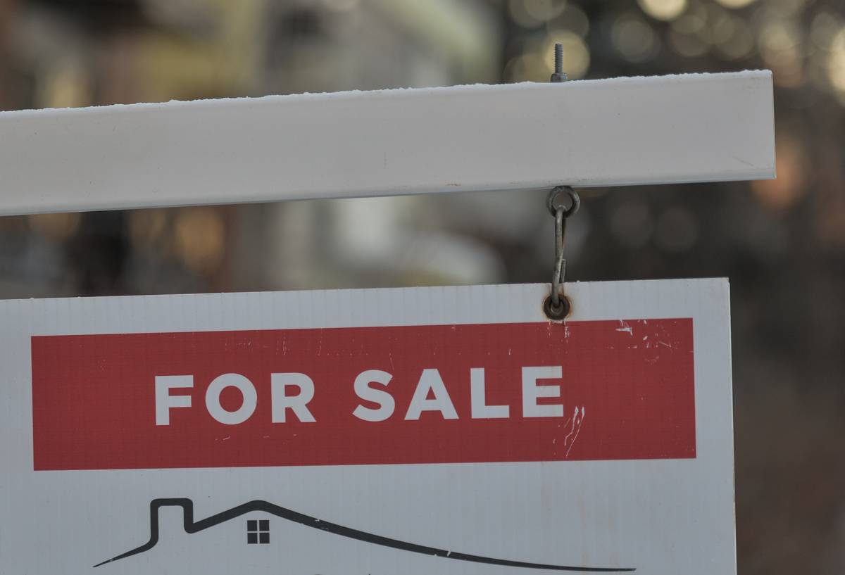 For Sale sign seen outside a house in the center of Edmonton. On Wednesday, January 19, 2021, in Edmonton, Alberta, Canada.