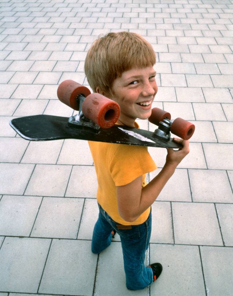 Red head boy and his toy