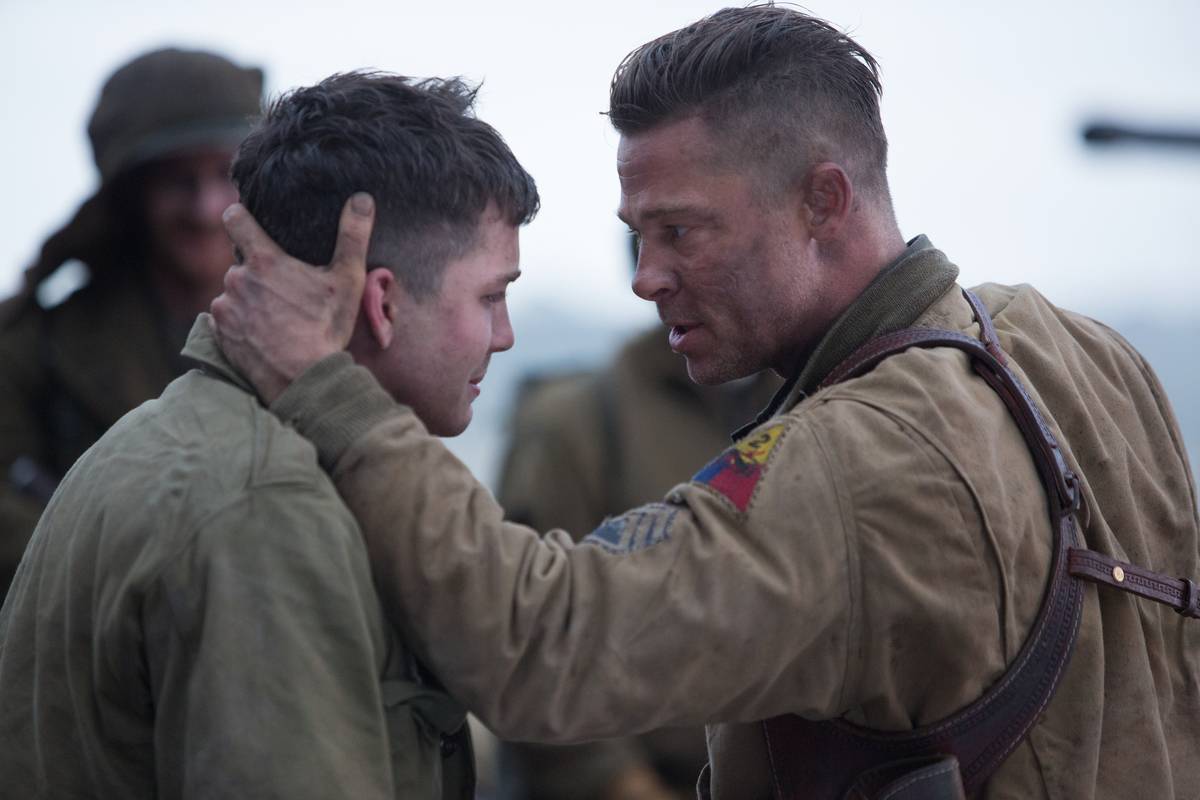 Brad Pitt grabbing the back of Logan Lerman's head in Fury