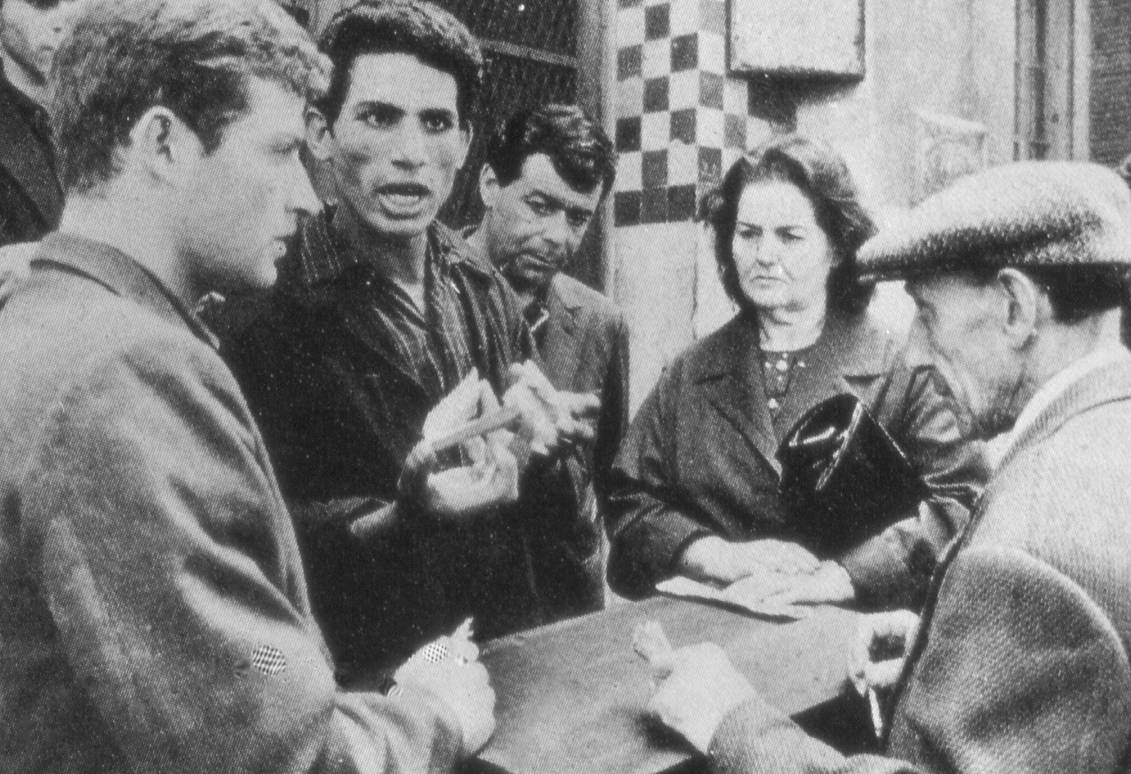 people discussing something passionately in The Battle of Algiers