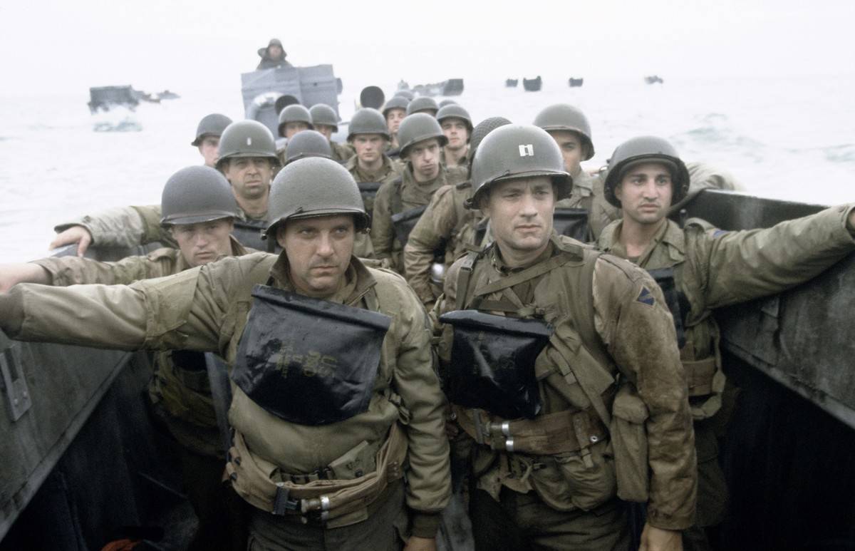 Tom Hanks and Tom Sizemore with other actors playing World War II soldiers head for Omaha Beach in boat in Saving Private Ryan