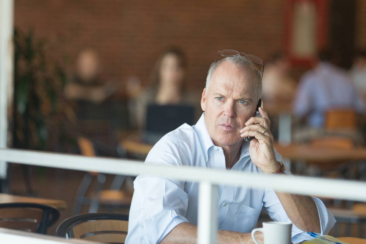 Michael Keaton talking on phone in Spotlight