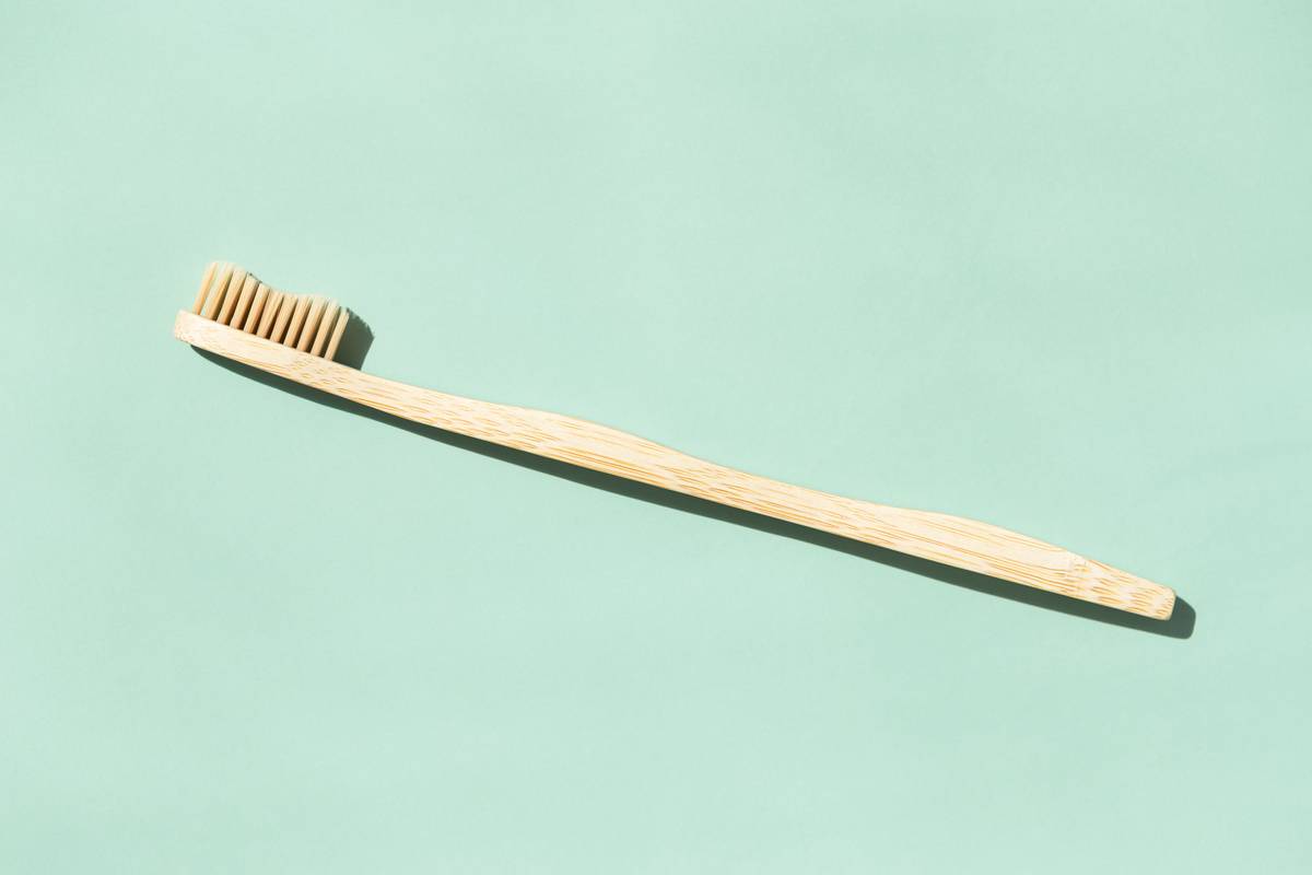 bamboo-toothbrush-top-view-2021-08-28-20-07-15-utc