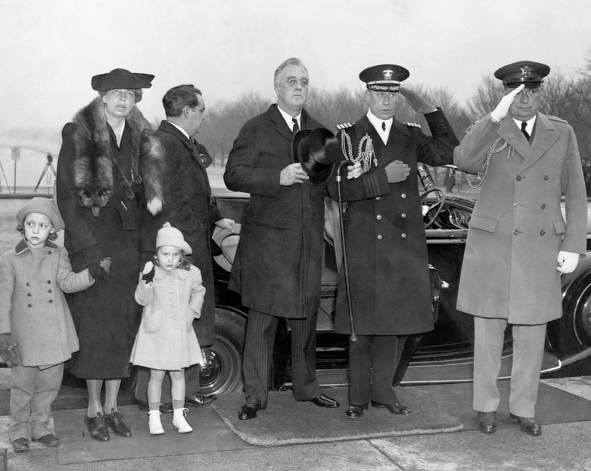 Franklin Roosevelt at a wreath-laying ceremony at the Lincoln Memorial.  From left to right, Diana Hopkins, Daughter of Harry Hopkins, Works 
Project Administrator; Eleanor Roosevelt, wife of the President; 
Chandler Roosevelt, daughter of Elliott Roosevelt, the President's son; 
President Franklin D. Roosevelt; his Naval Aide, Capt. Walter B. 
Woodson, and Col. Edwin Watson, his Military Aide.