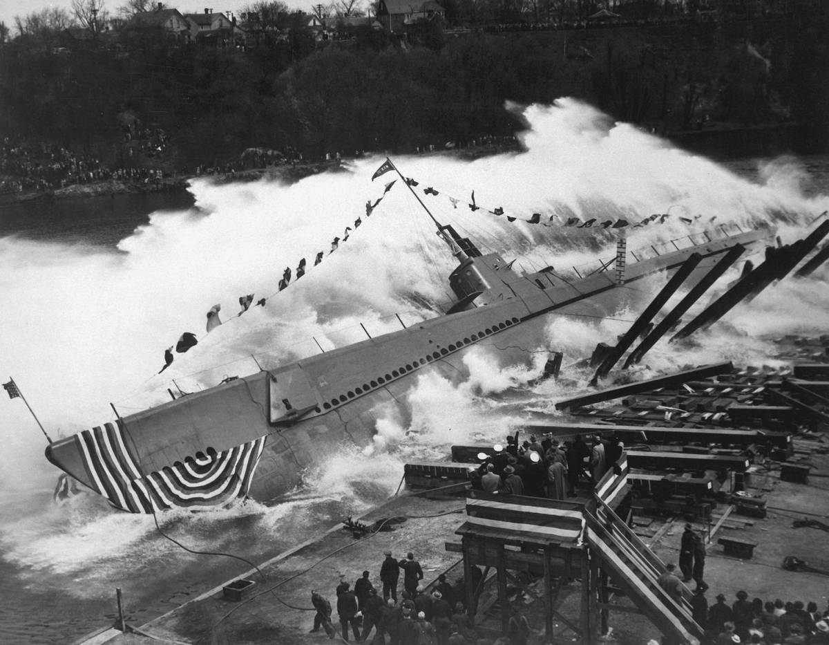 View of the launch of the US Navy submarine USS Robalo, at Manitowoc Shipbuilding Company, in Manitowoc, Wisconsin, May 9, 1943.