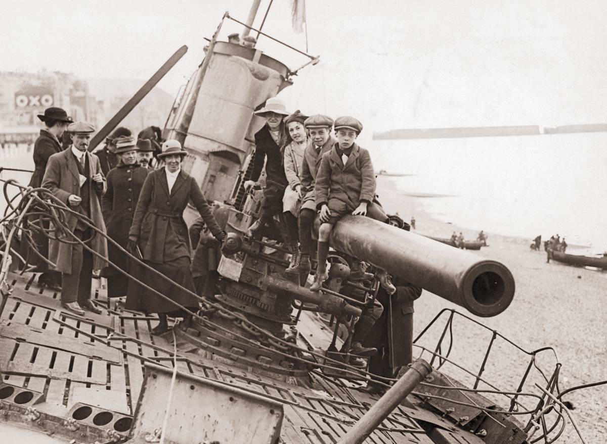 German U-Boat U-118 attracts the attention of locals after washing up on the beach at Hastings, 1919.