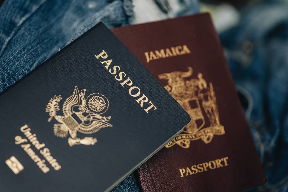 close-up-of-jamaican-passport-and-a-united-states-2022-11-15-06-43-11-utc