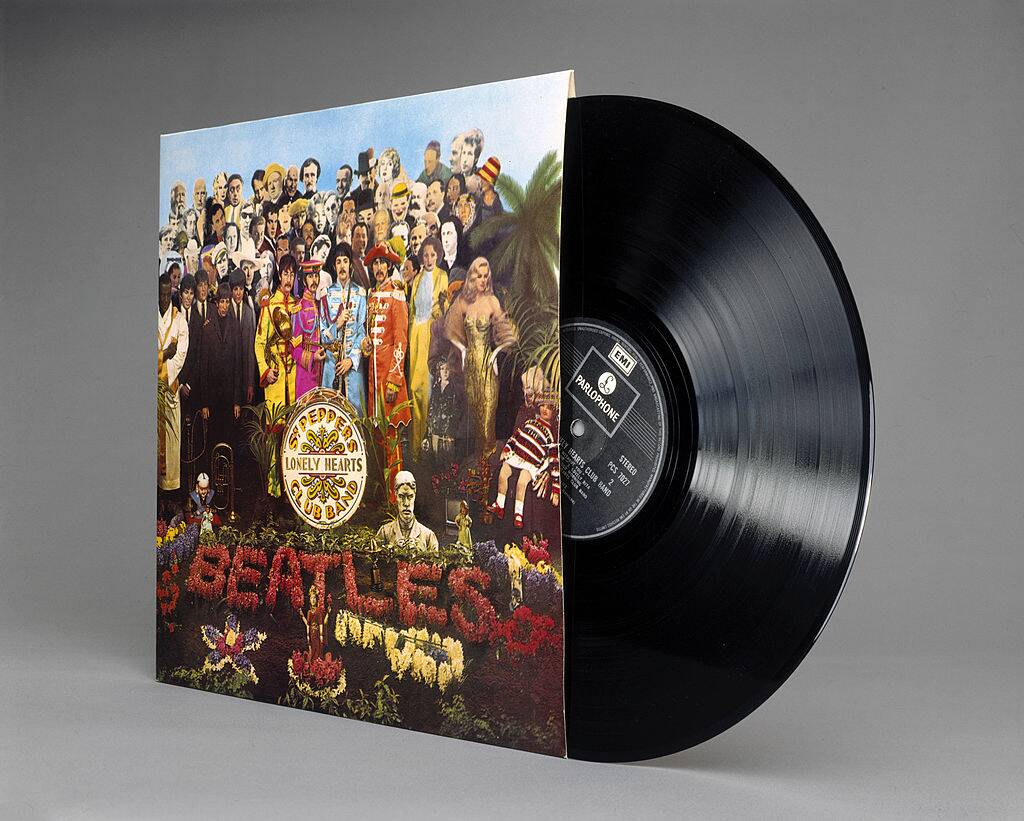 a vinyl of sgt. pepper's lonely hearts club band on display