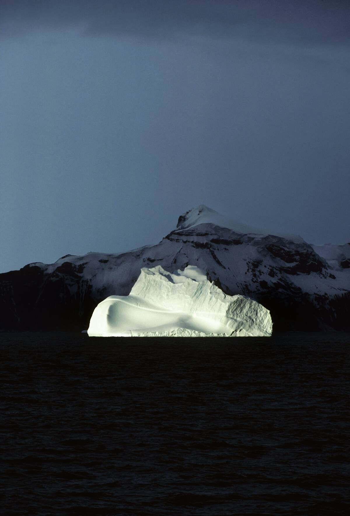Antarctica, Iceberg In Bransfield Strait, King George Island Background.