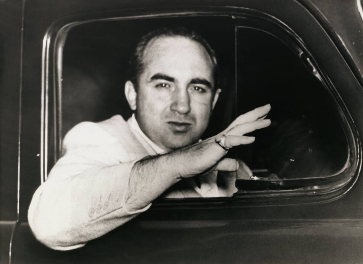 Gangster Mickey Cohen Waving Good Bye