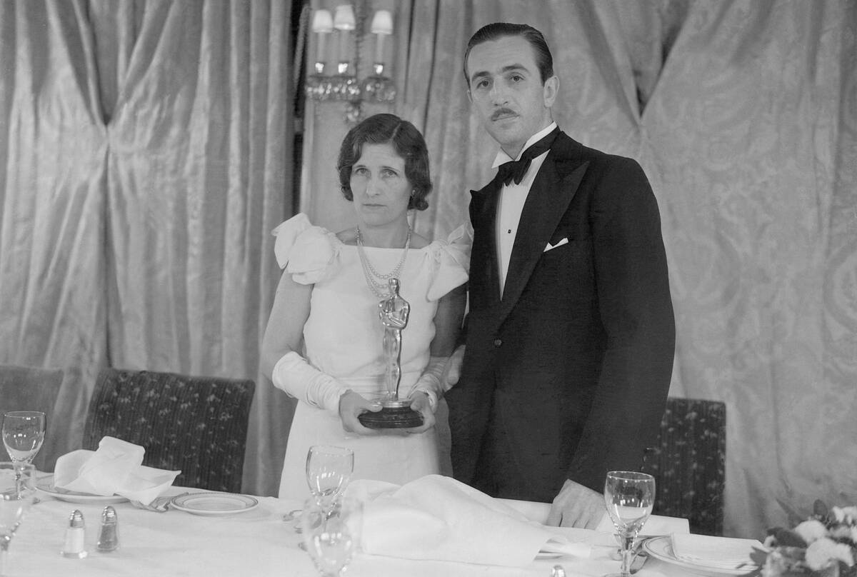 Mr. and Mrs. Walt Disney Posing at Banquet Table
