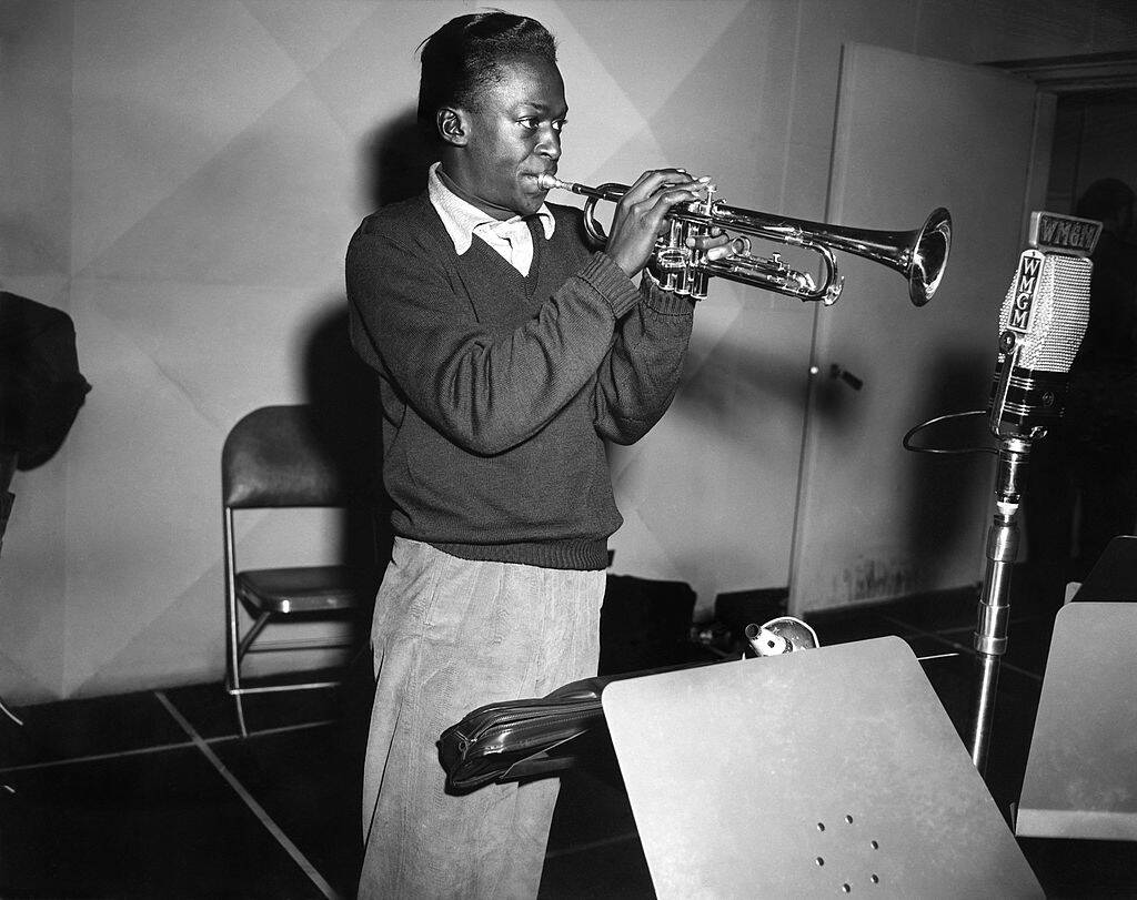 Miles Davis playing the trumpet