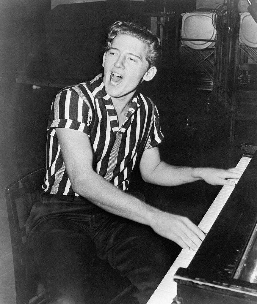 Jerry Lee Lewis singing and playing piano in 1957
