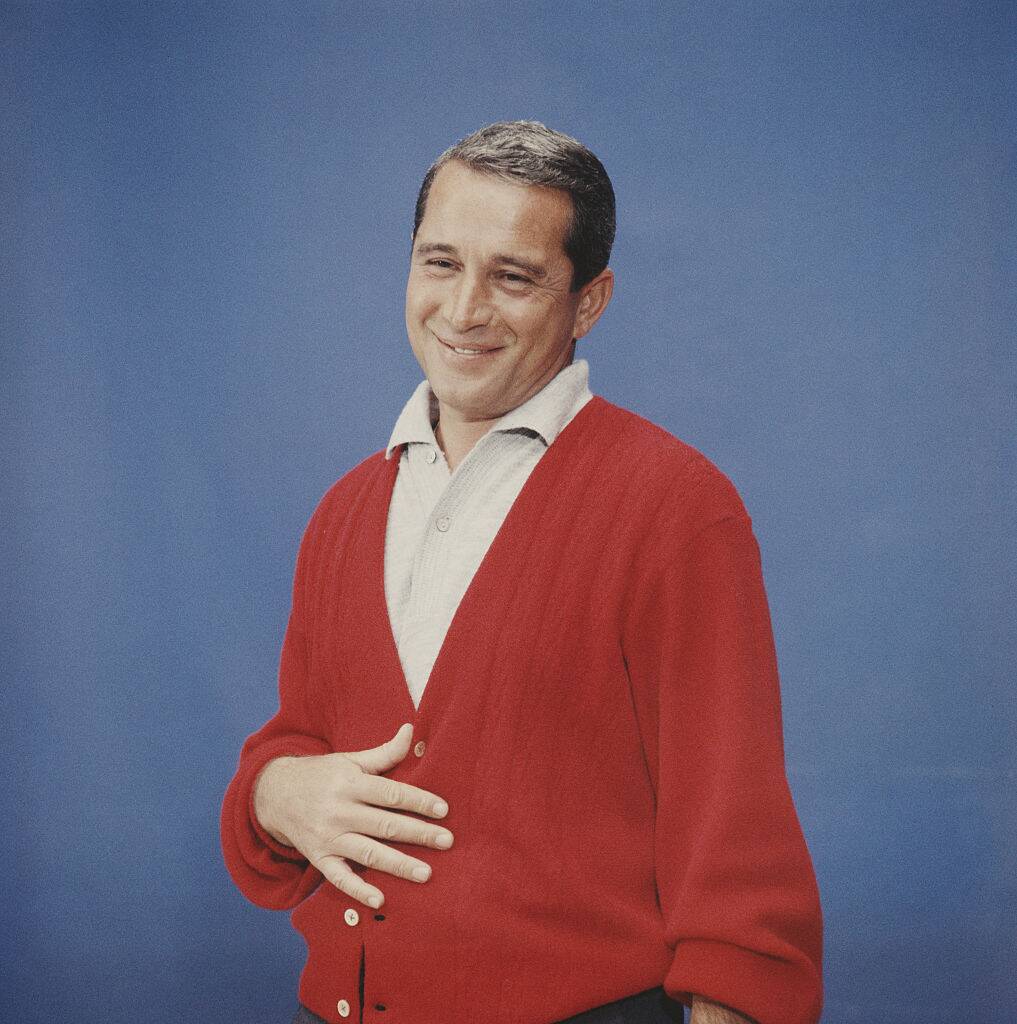 man wearing a red sweater
