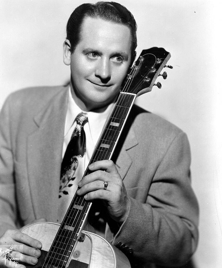 man holding a guitar
