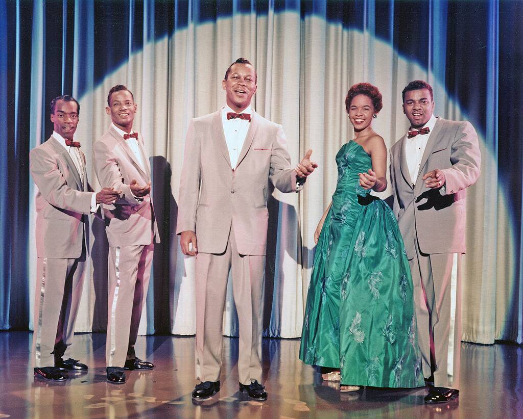 the platters performing on stage
