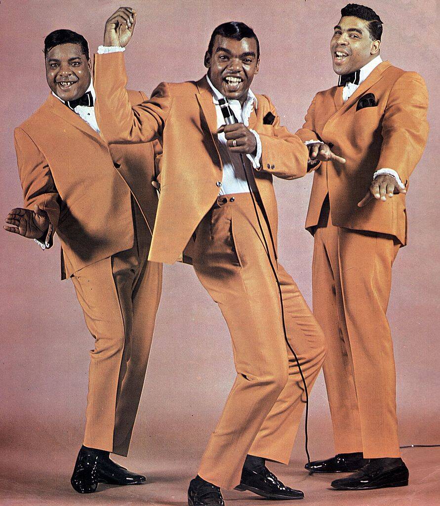 the isley brothers posing for a photo