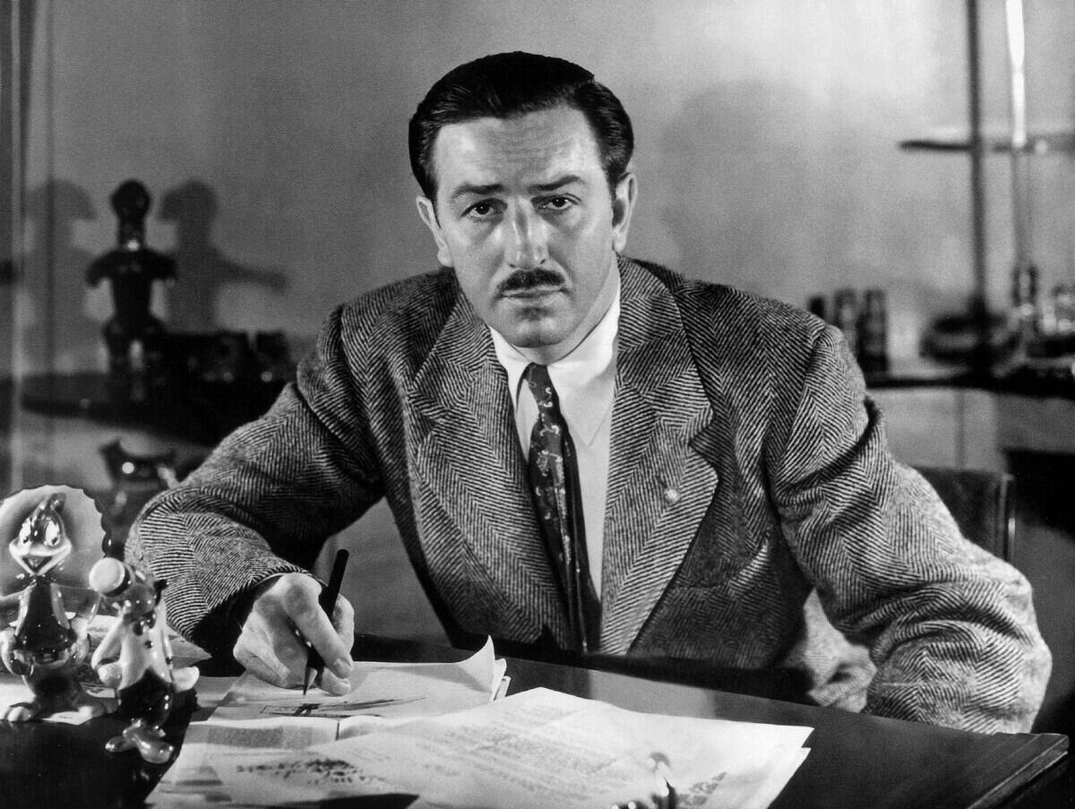 Walt Disney (1901-1966) at his desk c. 1945