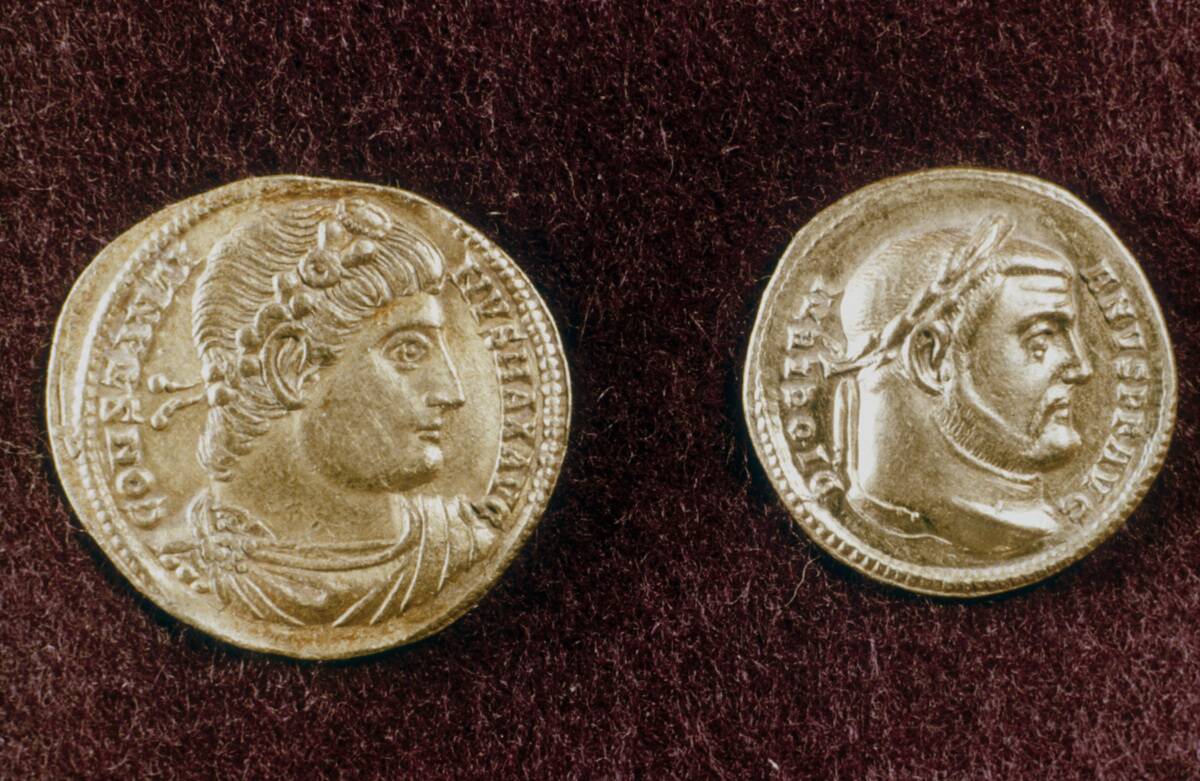 Gold coins showing heads of Roman Emperors Constantine the Great and Diocletian, 4th century.