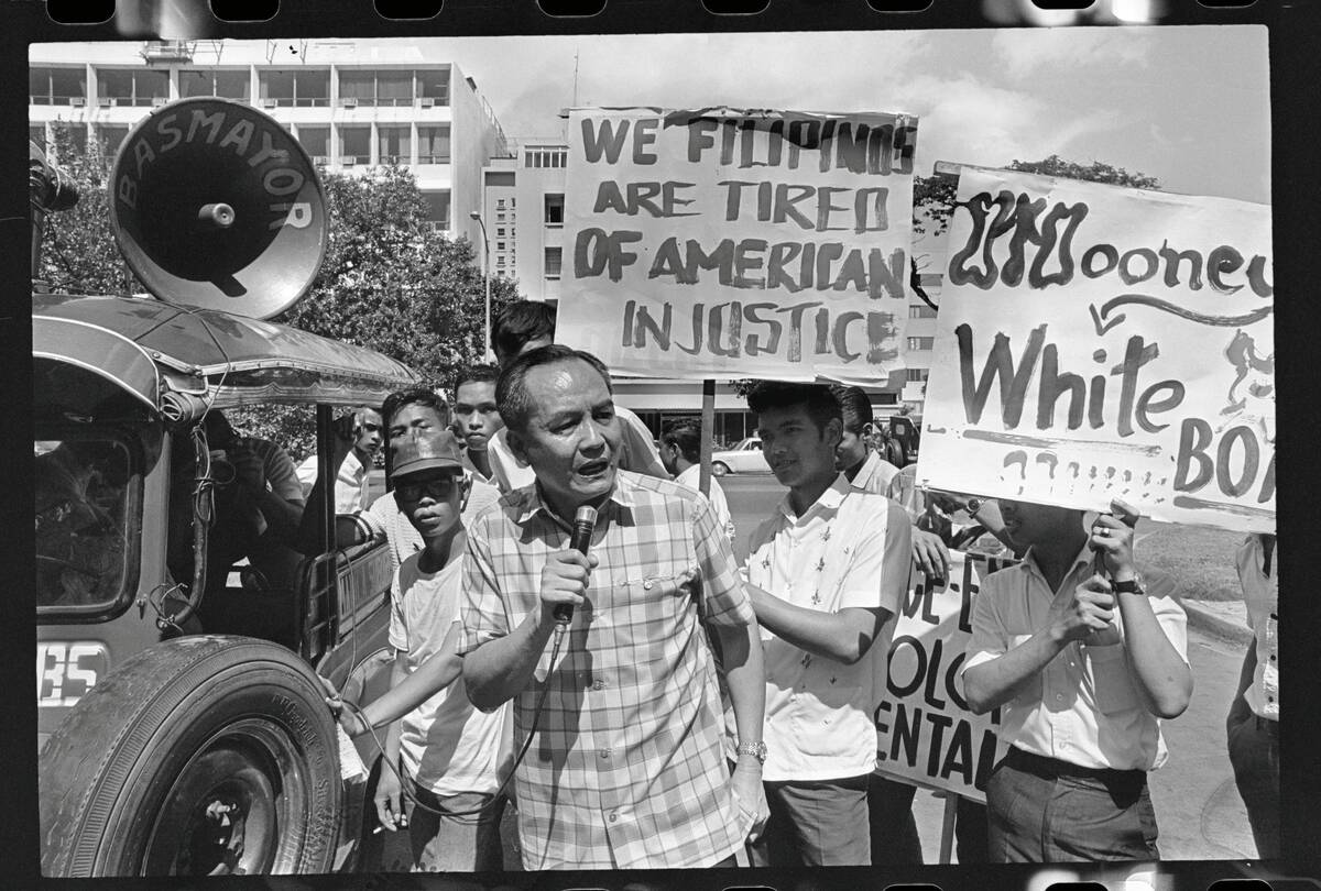 Manila Citizens Protesting with Signs